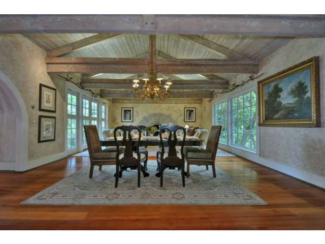 15670 Peach Hill Road Saratoga, CA 95070 - Photo 8 of 25 a dining room with furniture a chandelier and wooden floor