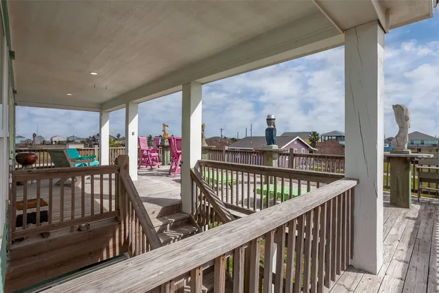 a view of balcony with furniture