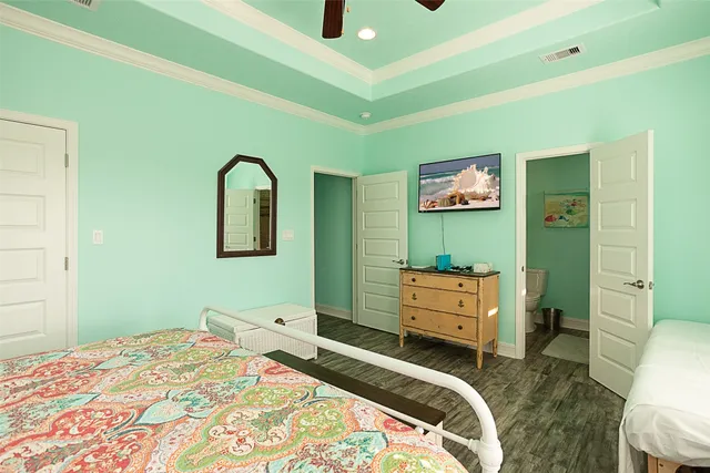 a bedroom with a bed and furniture