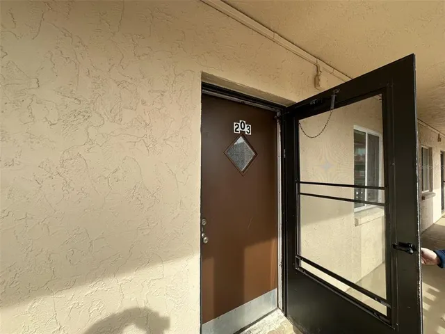 a white refrigerator freezer sitting inside of a kitchen