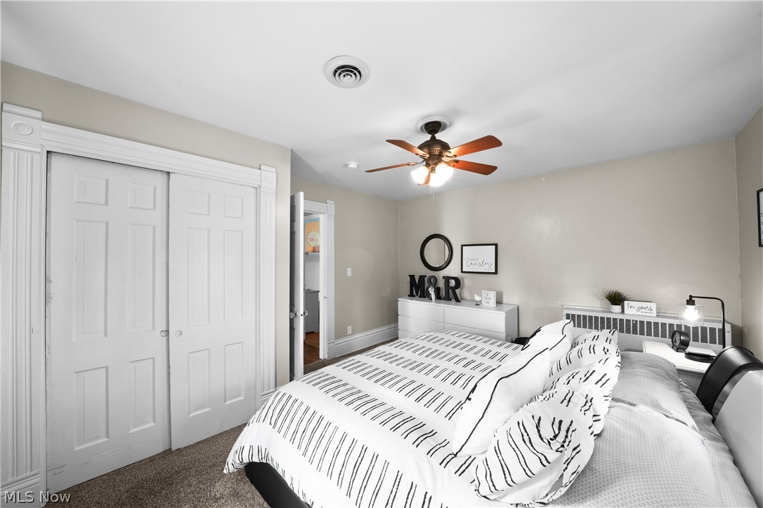 2069 State Road Northwest Warren, OH 44481 - Photo 23 of 45 Carpeted bedroom featuring a closet and ceiling fan