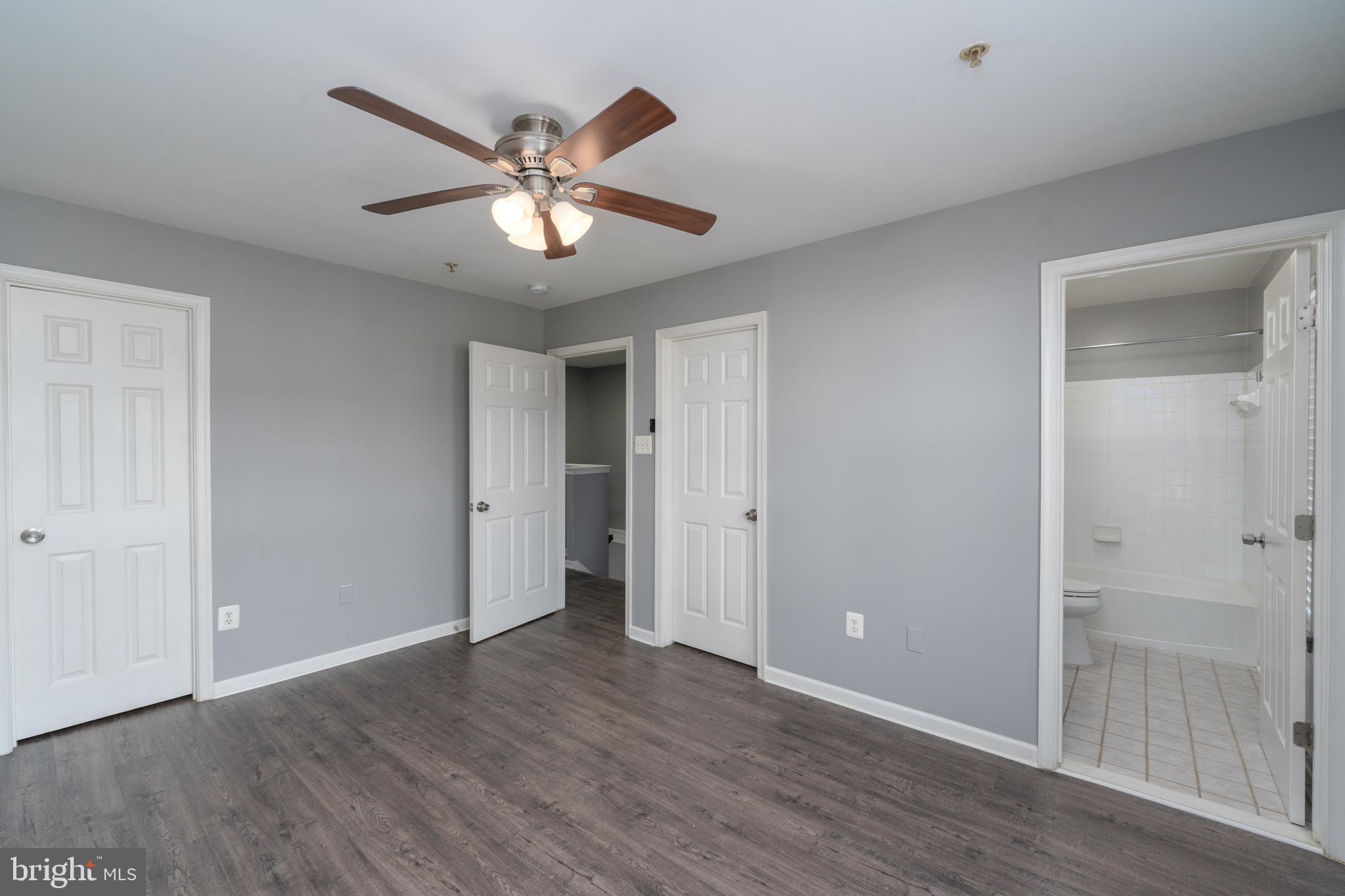 9903 Decatur Road Baltimore, MD 21220 - Photo 14 of 37 a view of an empty room with wooden floor