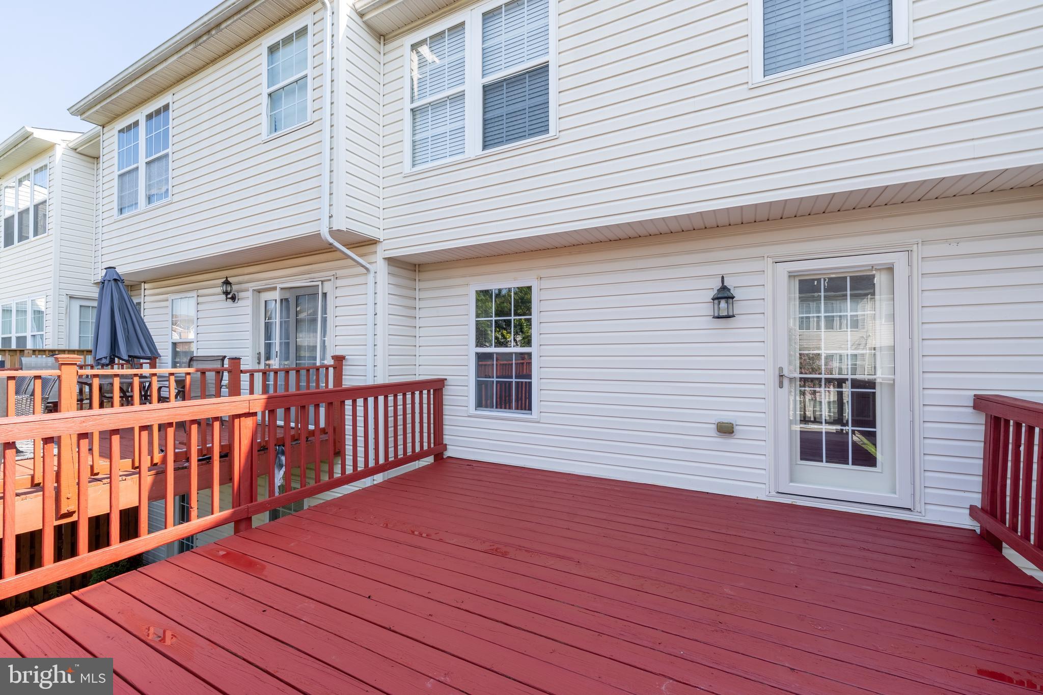 9903 Decatur Road Baltimore, MD 21220 - Photo 31 of 37 a view of a house with wooden deck