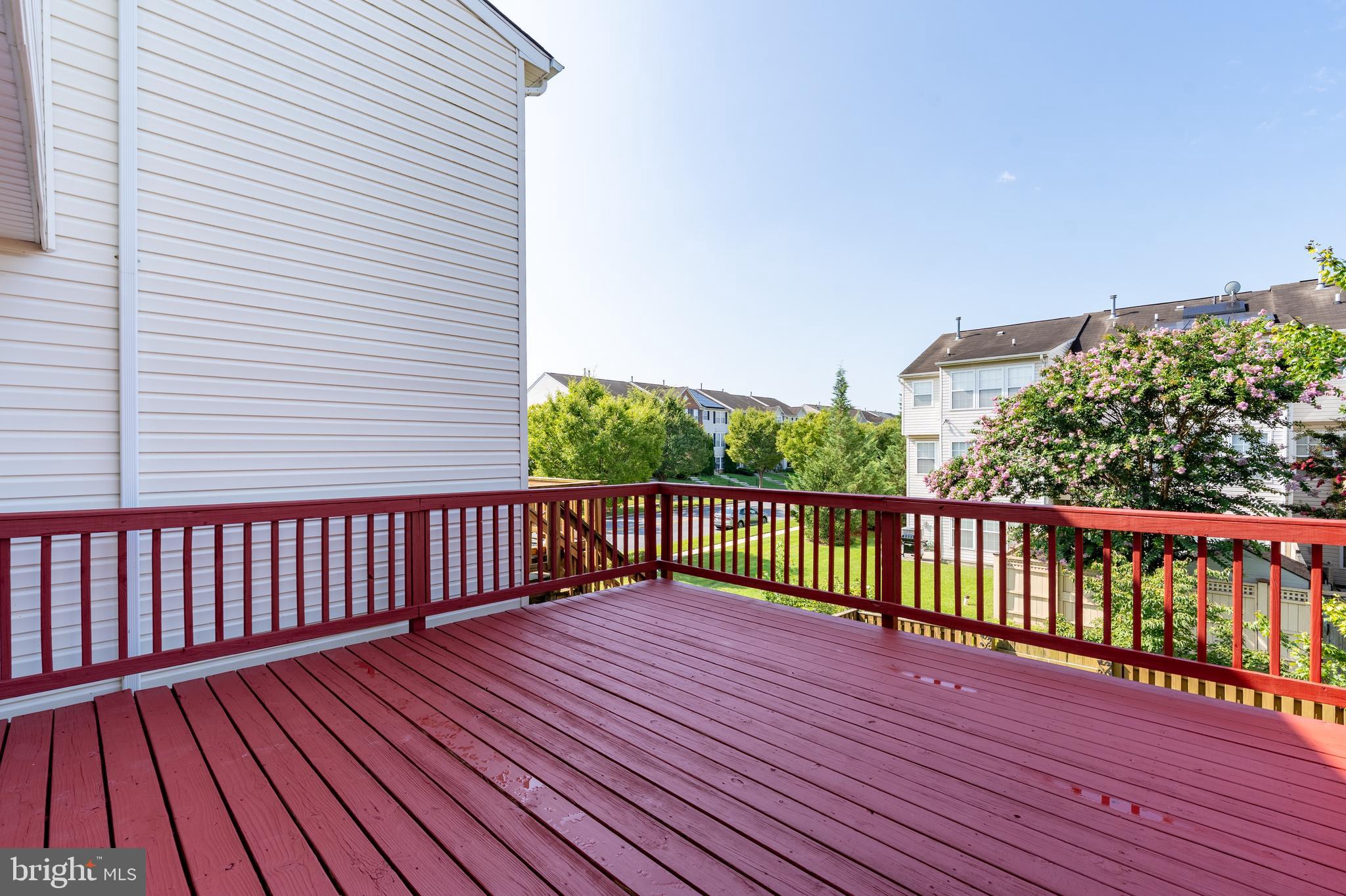 9903 Decatur Road Baltimore, MD 21220 - Photo 32 of 37 a view of balcony with wooden floor