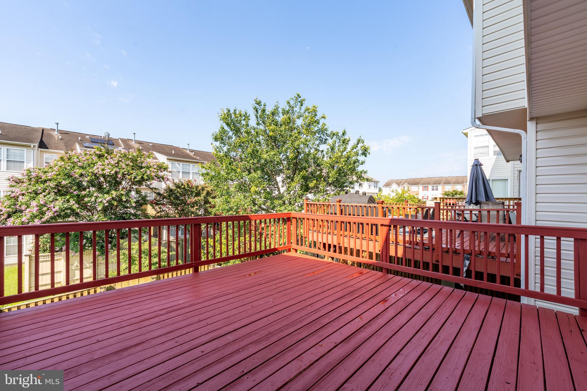 9903 Decatur Road Baltimore, MD 21220 - Photo 33 of 37 a view of balcony with wooden floor