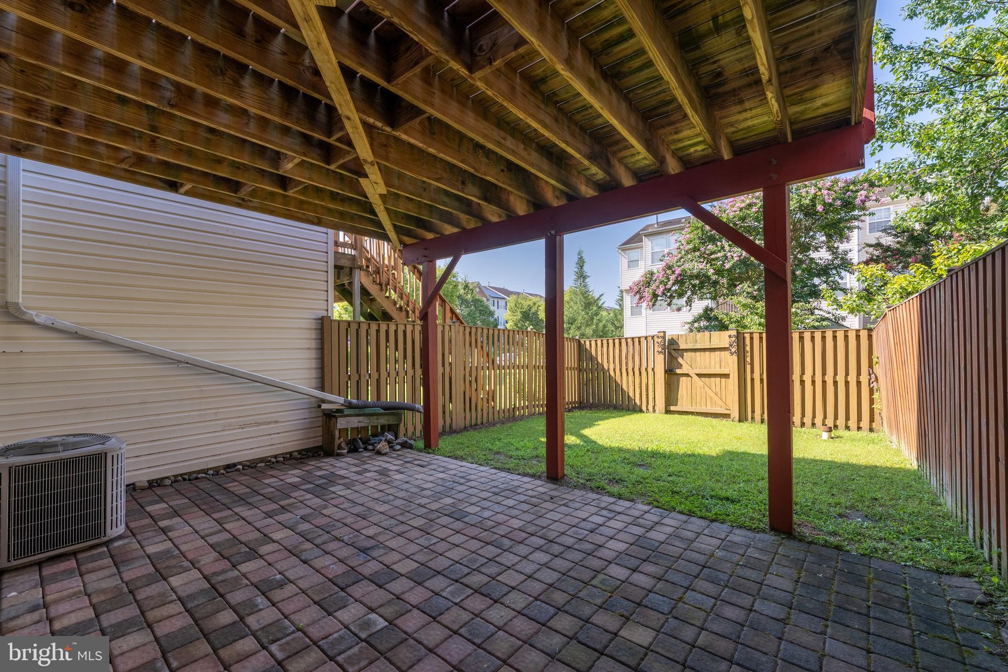 9903 Decatur Road Baltimore, MD 21220 - Photo 35 of 37 a view of a backyard with wooden fence