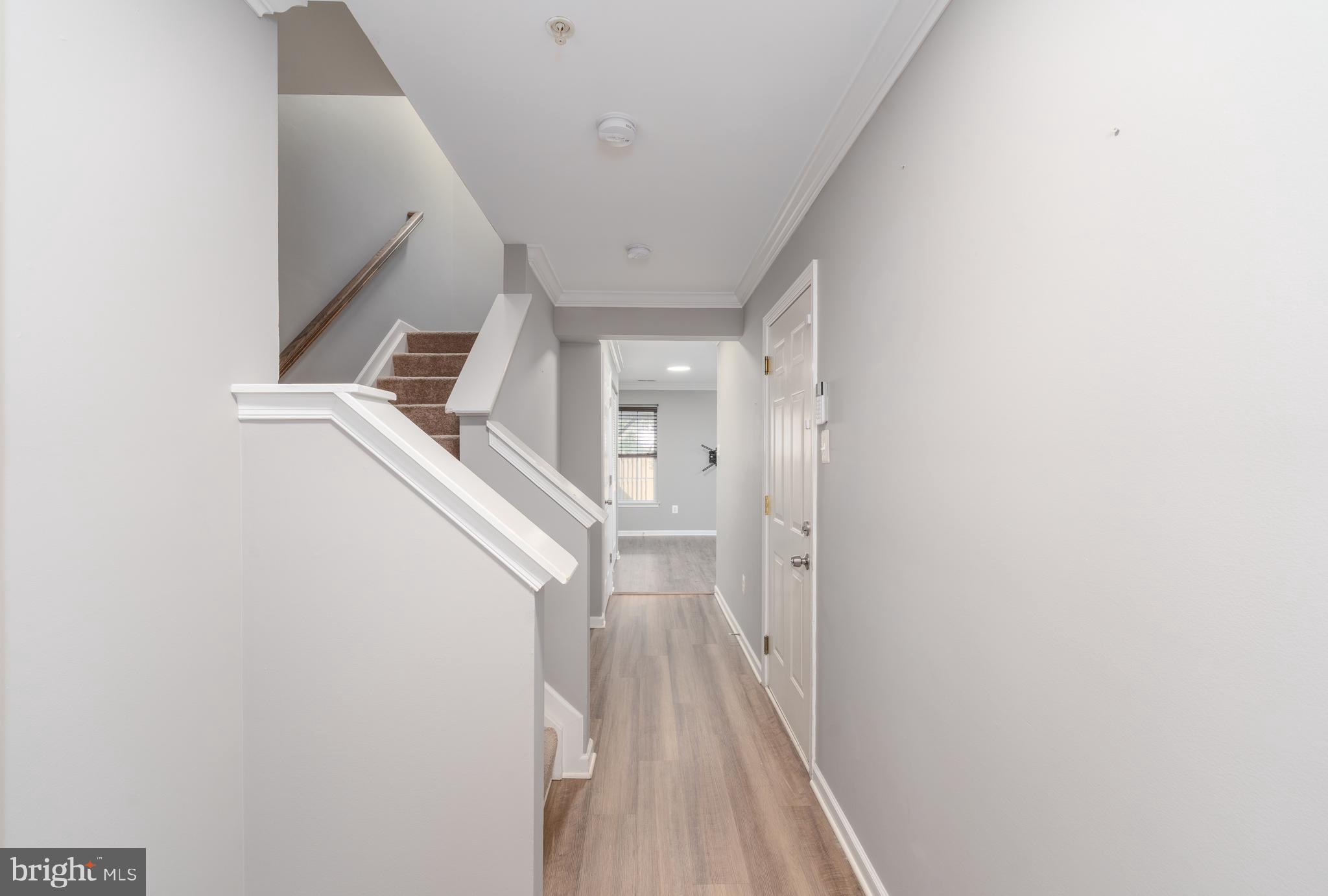 9903 Decatur Road Baltimore, MD 21220 - Photo 6 of 37 a view of entryway with wooden floor