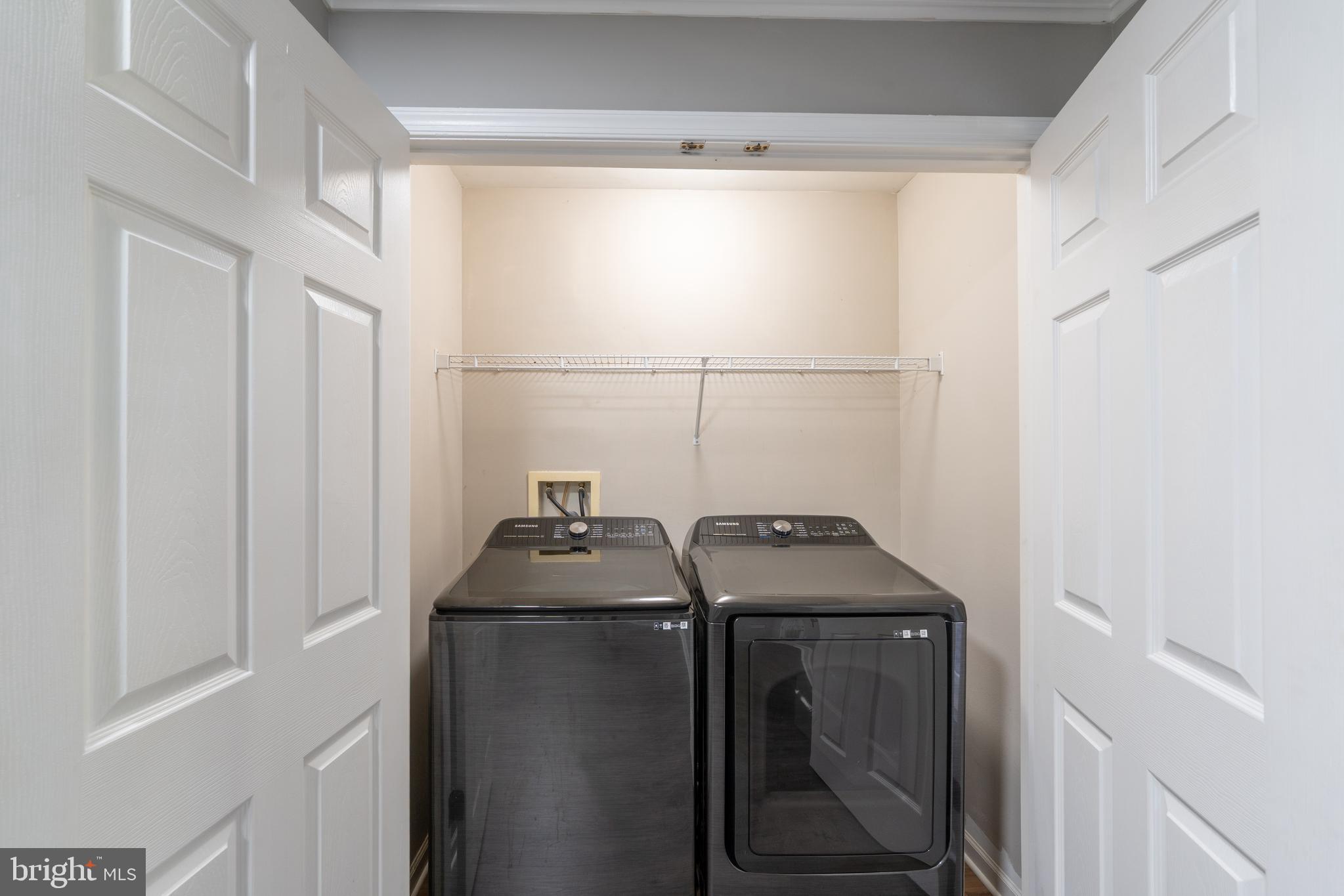 9903 Decatur Road Baltimore, MD 21220 - Photo 8 of 37 a utility room with dryer and washer