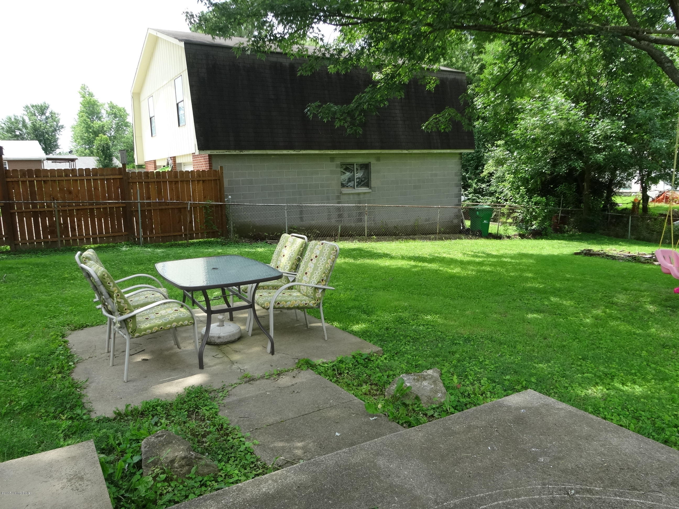 9616 Maple Road Louisville, KY 40229 - Photo 21 of 33 Small patio off the main patio. (Former HOT TUB Pad)