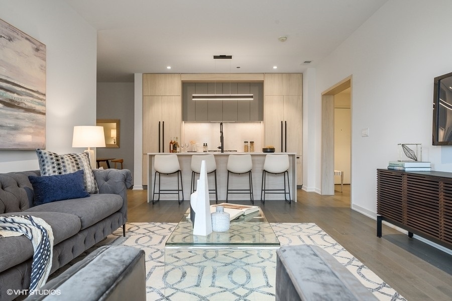 1400 West Monroe Street, Unit 5F Chicago, IL 60607 - Photo 11 of 25 a living room with furniture and wooden floor