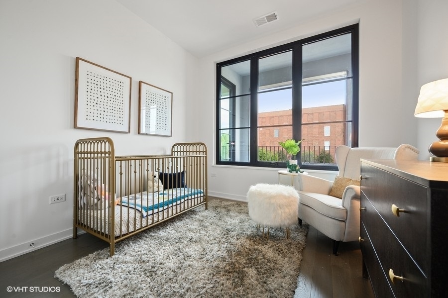 1400 West Monroe Street, Unit 5F Chicago, IL 60607 - Photo 18 of 25 a living room with furniture and a window with balcony view