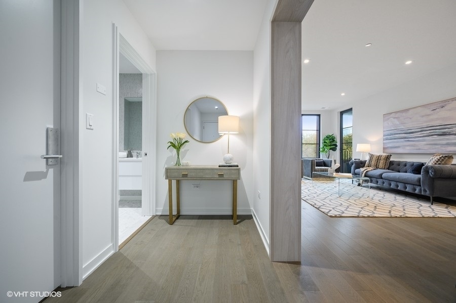 1400 West Monroe Street, Unit 5F Chicago, IL 60607 - Photo 3 of 25 a view of living room kitchen with a sink and dishwasher with kitchen view
