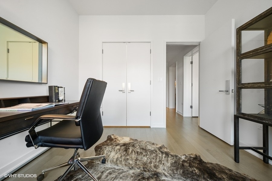 1400 West Monroe Street, Unit 5F Chicago, IL 60607 - Photo 21 of 25 a view of a workspace with furniture and a window