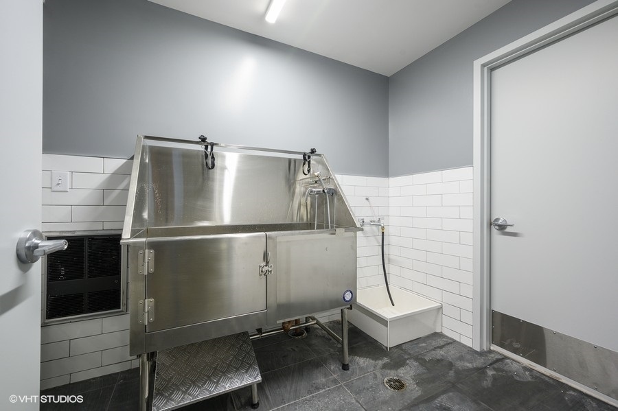 1400 West Monroe Street, Unit 5F Chicago, IL 60607 - Photo 25 of 25 a room with a walk in closet and wooden floor