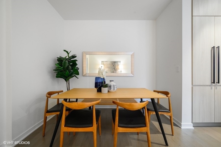 1400 West Monroe Street, Unit 5F Chicago, IL 60607 - Photo 8 of 25 a dining room with furniture and window