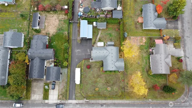 aerial view of a house with a yard