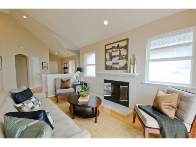 538 Monterey Road, Unit B Pacifica, CA 94044 - Photo 4 of 25 a living room with furniture and a fireplace