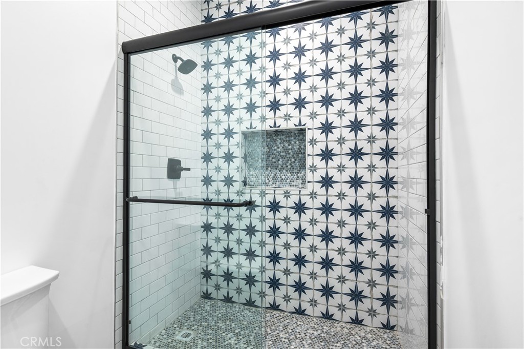 5000 Cleon Avenue, Unit 1/2 North Hollywood, CA 91601 - Photo 13 of 36 a bathroom with a shower and a sink