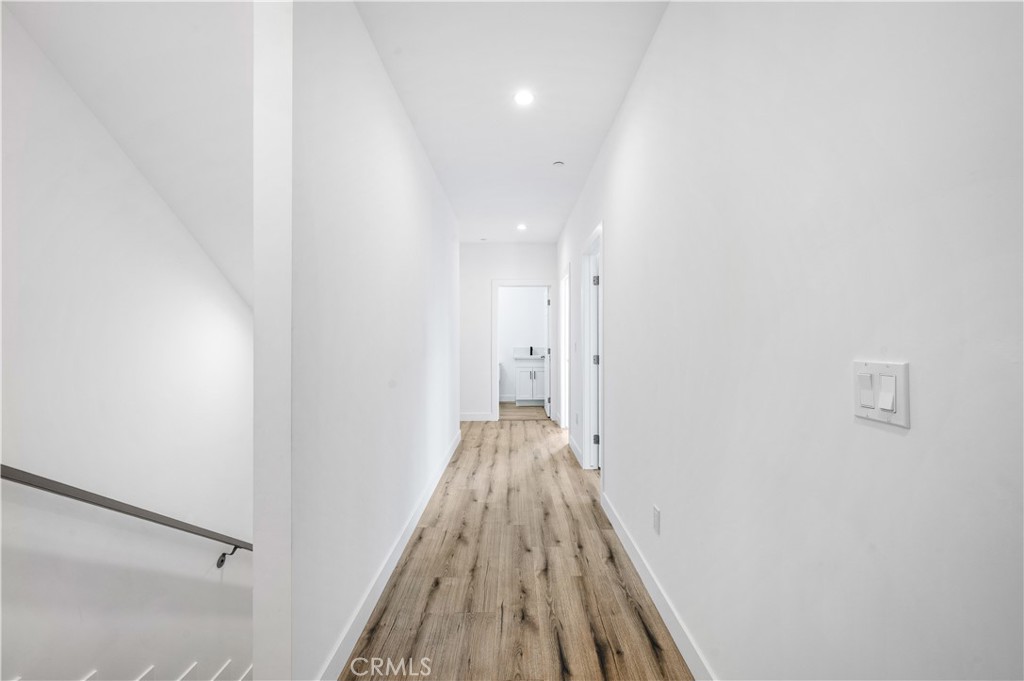 5000 Cleon Avenue, Unit 1/2 North Hollywood, CA 91601 - Photo 15 of 36 a view of a hallway with wooden floor and closet