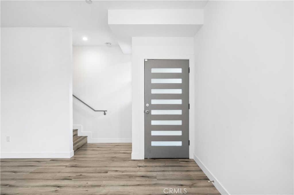 5000 Cleon Avenue, Unit 1/2 North Hollywood, CA 91601 - Photo 2 of 36 a view of entryway and hall with wooden floor