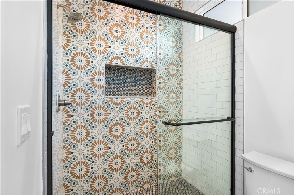 5000 Cleon Avenue, Unit 1/2 North Hollywood, CA 91601 - Photo 28 of 36 a bathroom with a shower and a toilet