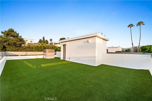 a view of a back yard with an outdoor space