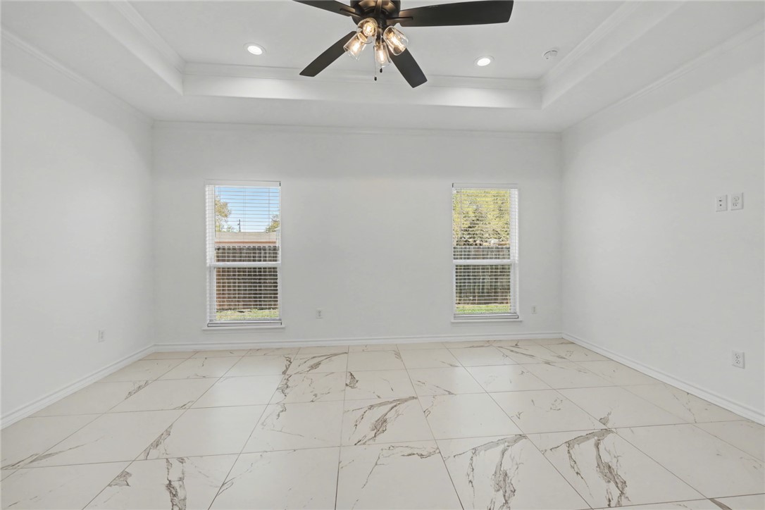 118 Amethyst Street Portland, TX 78374 - Photo 13 of 39 a view of an empty room with a window