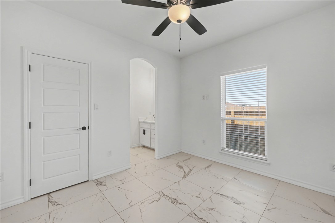 118 Amethyst Street Portland, TX 78374 - Photo 21 of 39 a view of an empty room with a window