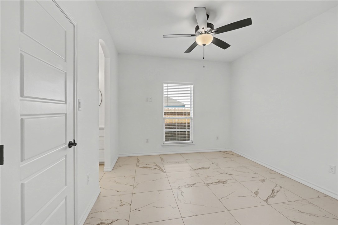118 Amethyst Street Portland, TX 78374 - Photo 22 of 39 a view of an empty room with a window