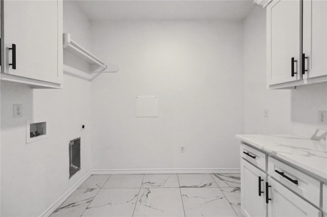118 Amethyst Street Portland, TX 78374 - Photo 29 of 39 a view of storage and utility room with closet