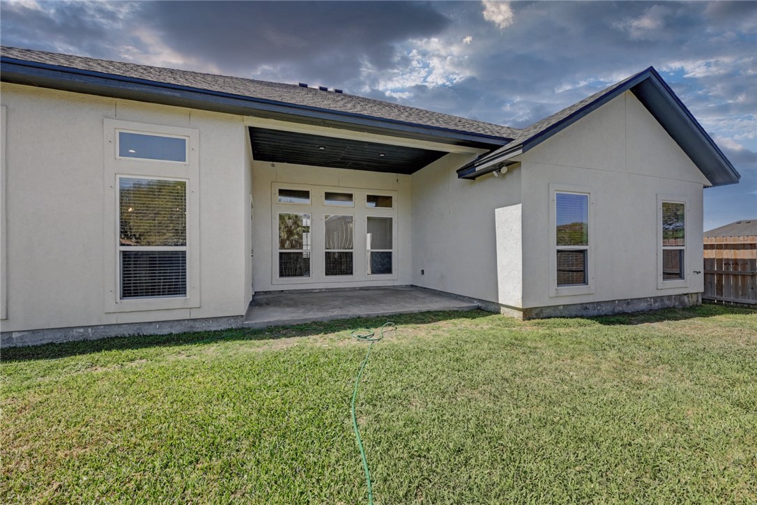 118 Amethyst Street Portland, TX 78374 - Photo 30 of 39 a view of a backyard of the house