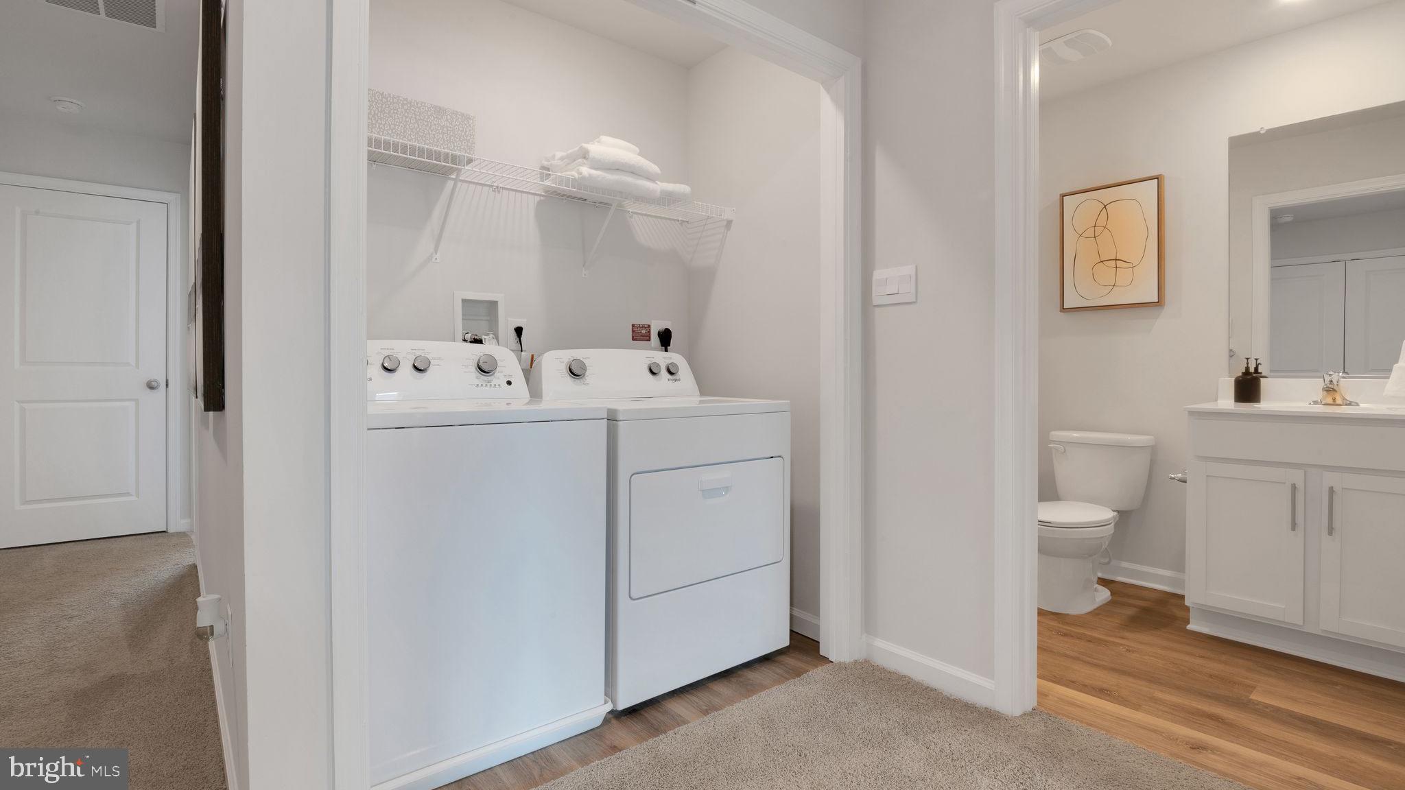 4 Whaler Drive Runnemede, NJ 08078 - Photo 18 of 24 a bathroom with a sink a toilet and a mirror