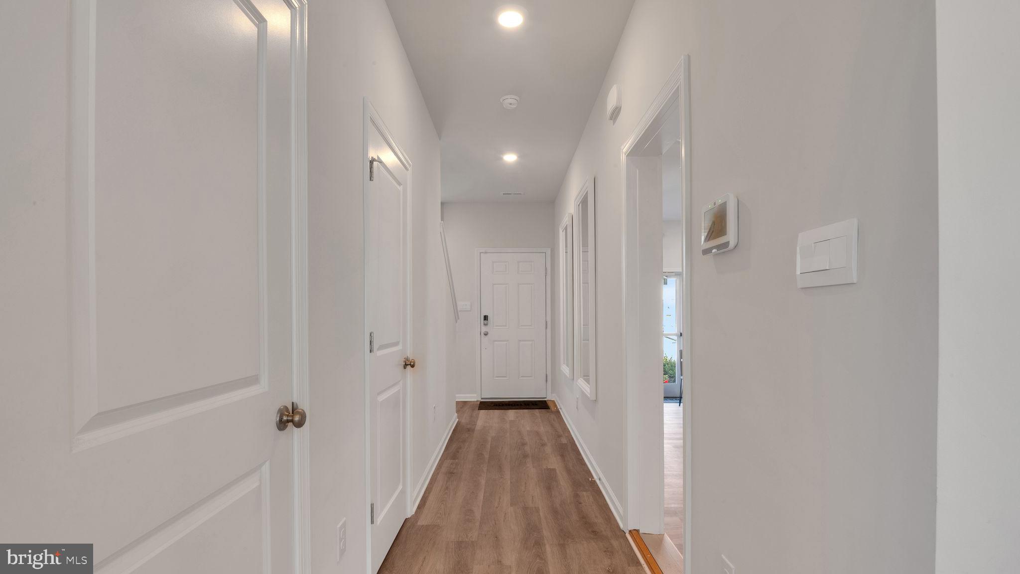 4 Whaler Drive Runnemede, NJ 08078 - Photo 7 of 24 a view of a hallway with wooden floor