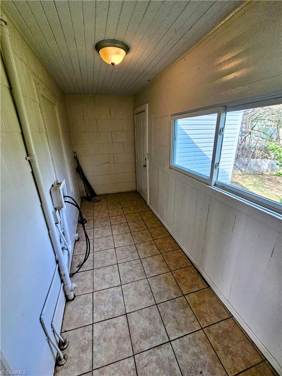 607 Arch Street High Point, NC 27260 - Photo 16 of 23 Large laundry room would make great pantry - door leads to private backyard