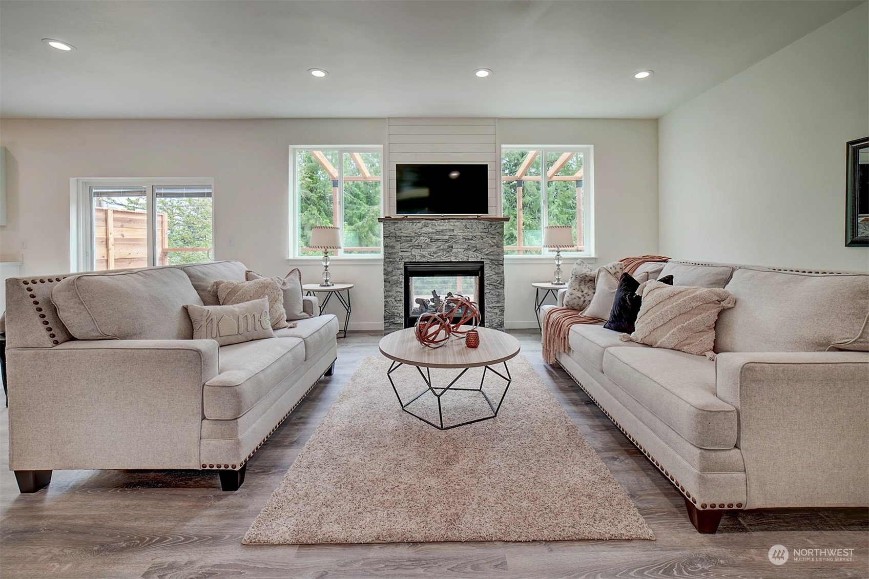 835 Northwest Finn Hill Road Poulsbo, WA 98370 - Photo 13 of 40 a living room with furniture fireplace and window