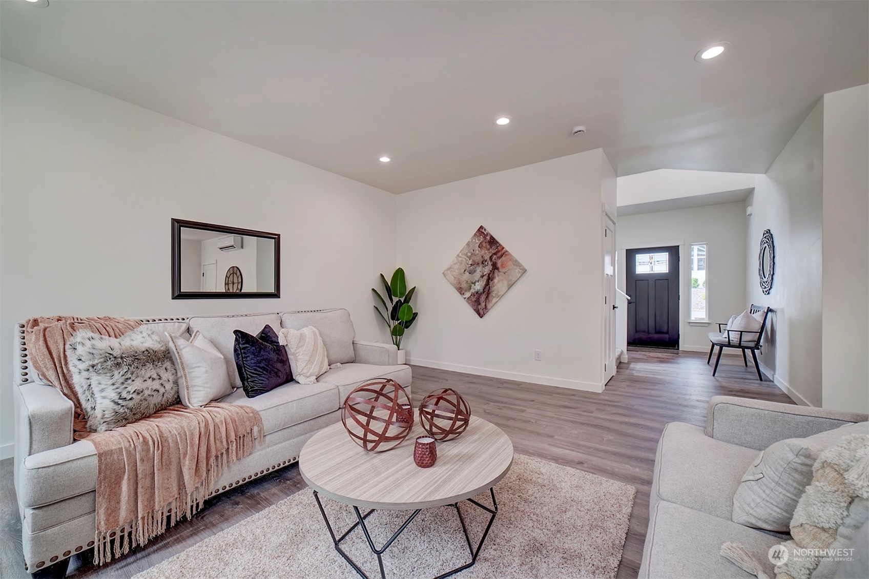 835 Northwest Finn Hill Road Poulsbo, WA 98370 - Photo 15 of 40 a living room with furniture and a wooden floor