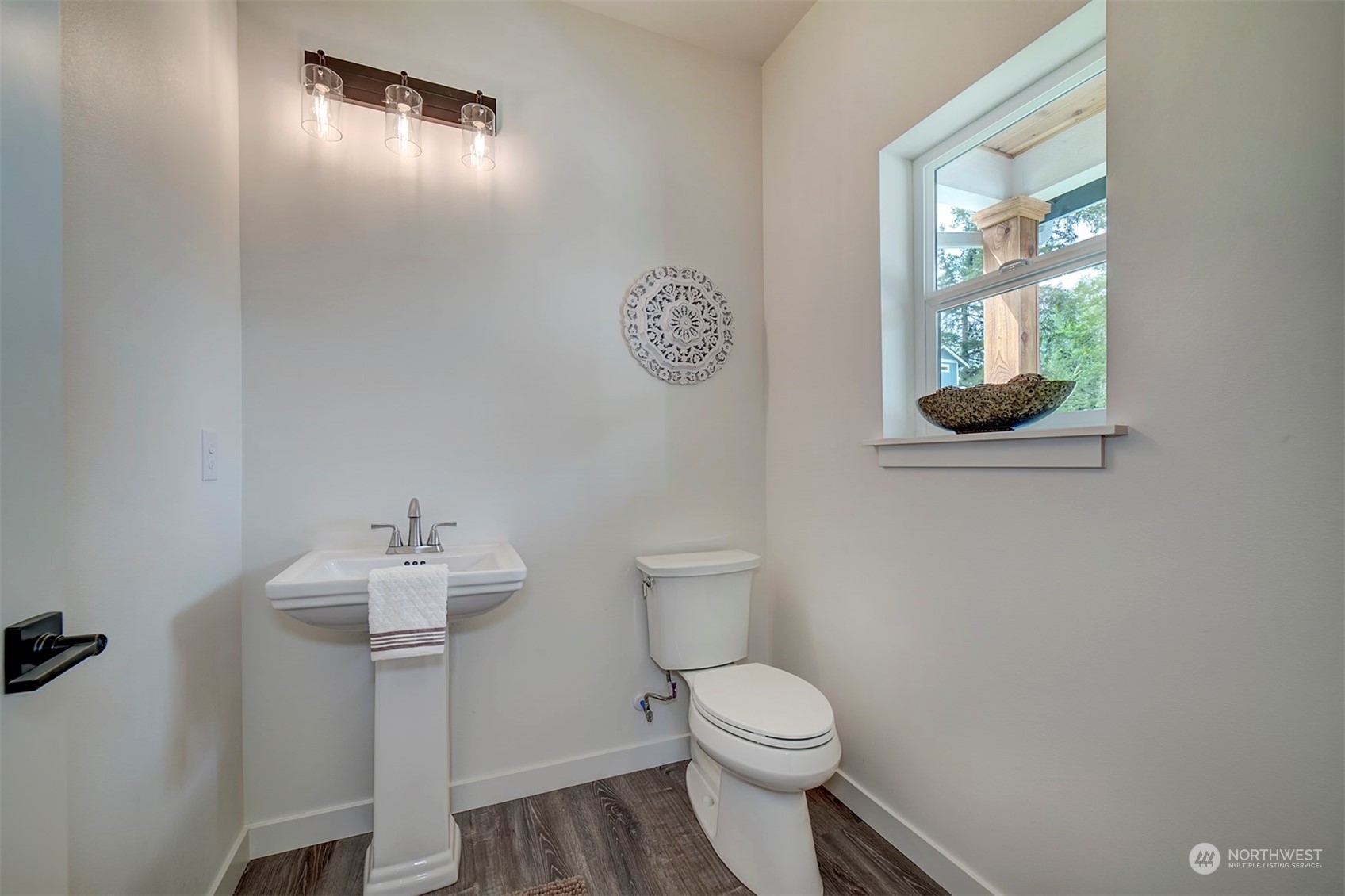 835 Northwest Finn Hill Road Poulsbo, WA 98370 - Photo 17 of 40 a bathroom with a toilet sink and mirror