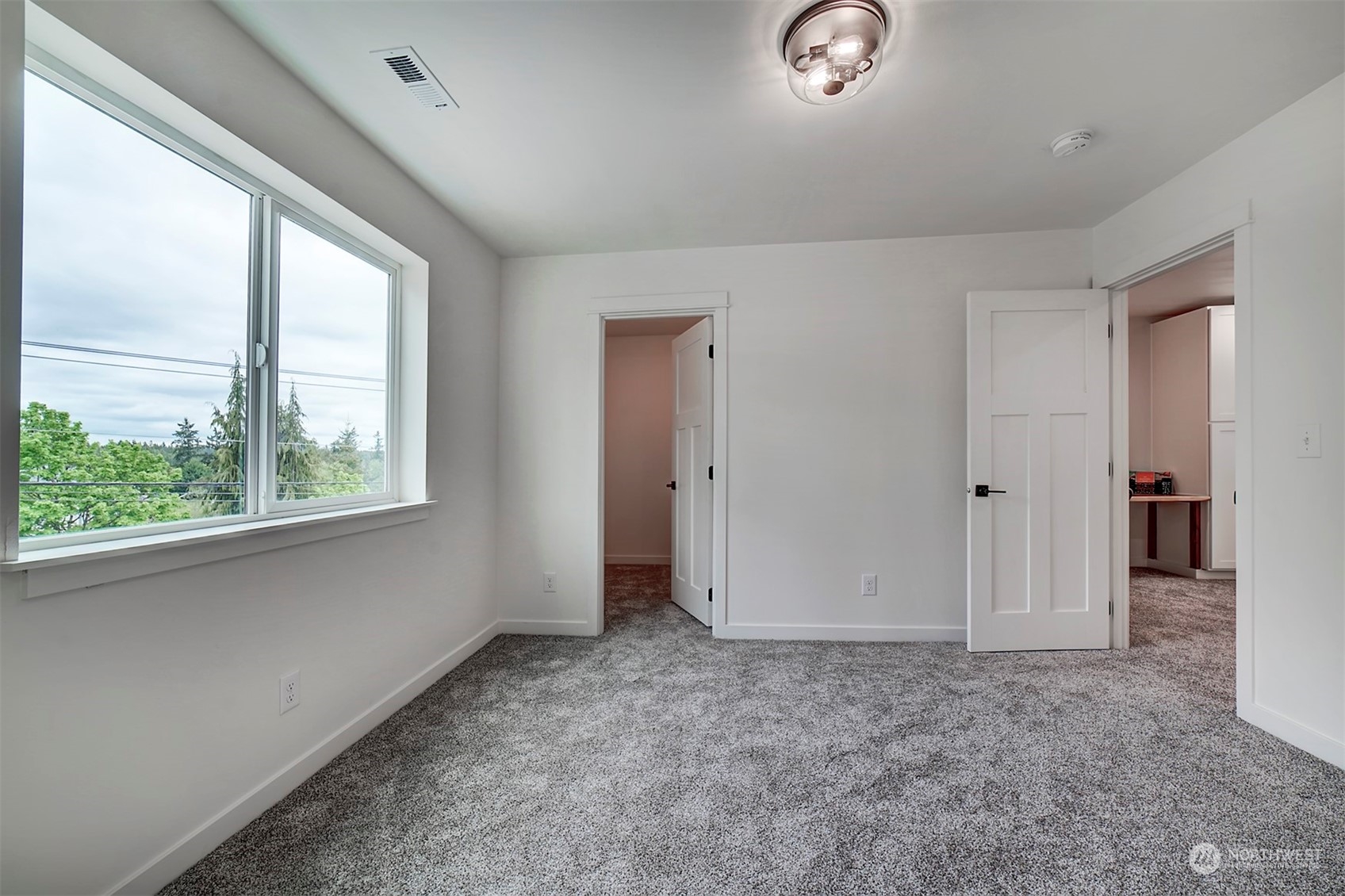 835 Northwest Finn Hill Road Poulsbo, WA 98370 - Photo 19 of 40 a view of an empty room with a window