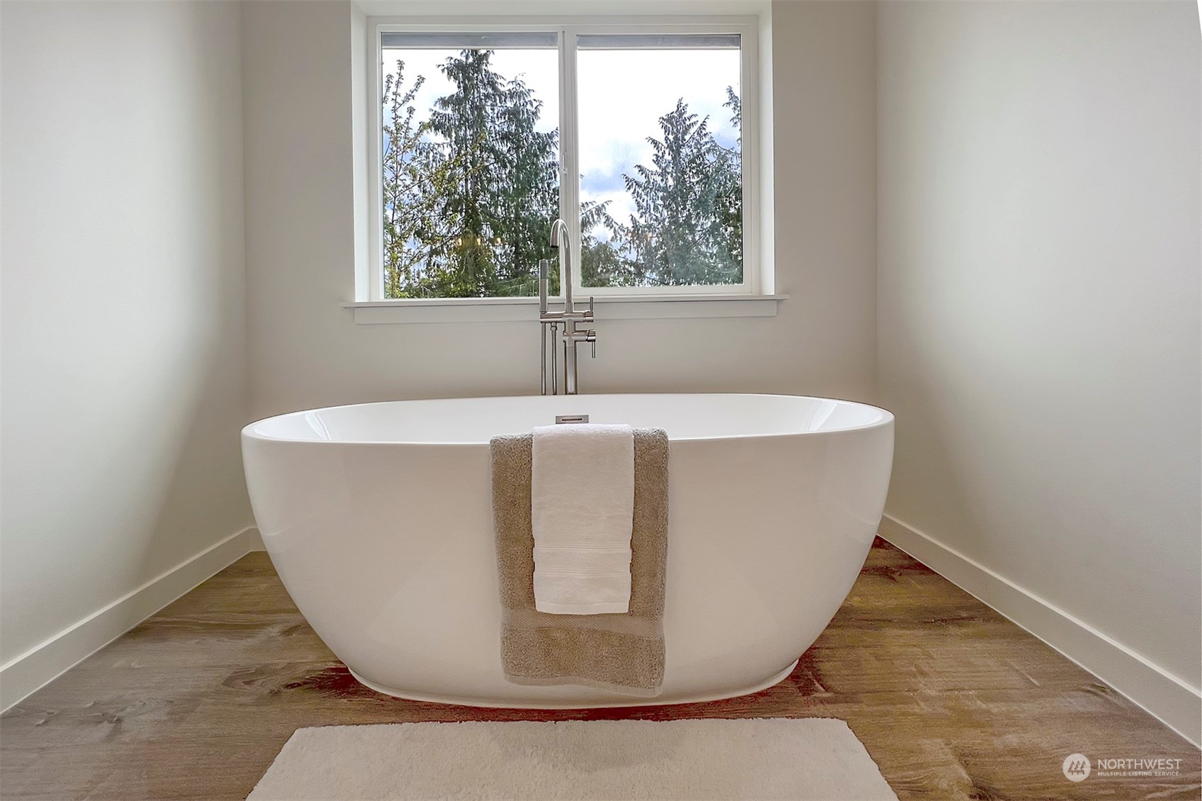835 Northwest Finn Hill Road Poulsbo, WA 98370 - Photo 25 of 40 a white bath tub sitting in a bathroom