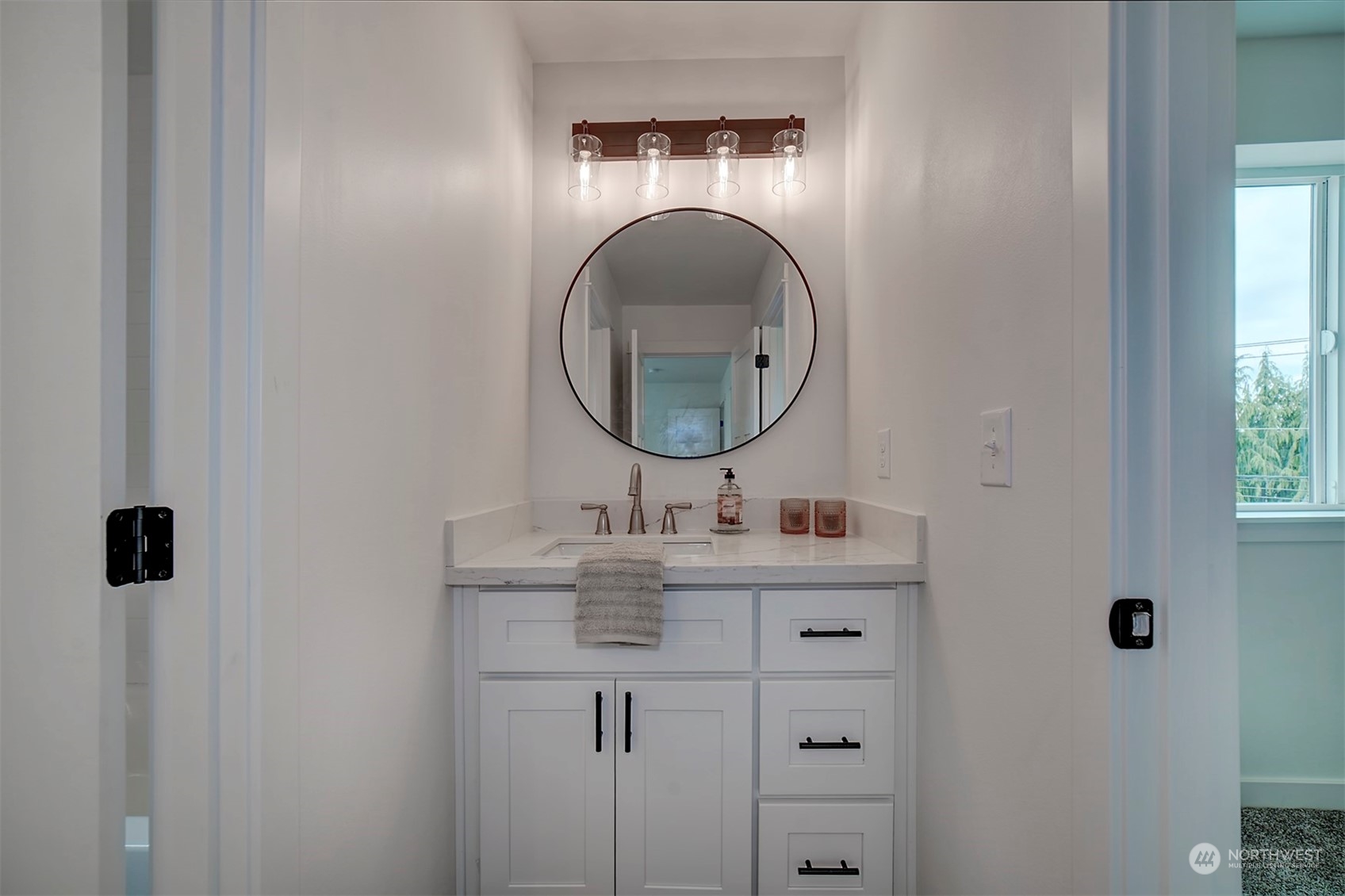 835 Northwest Finn Hill Road Poulsbo, WA 98370 - Photo 35 of 40 a bathroom with a sink and a mirror