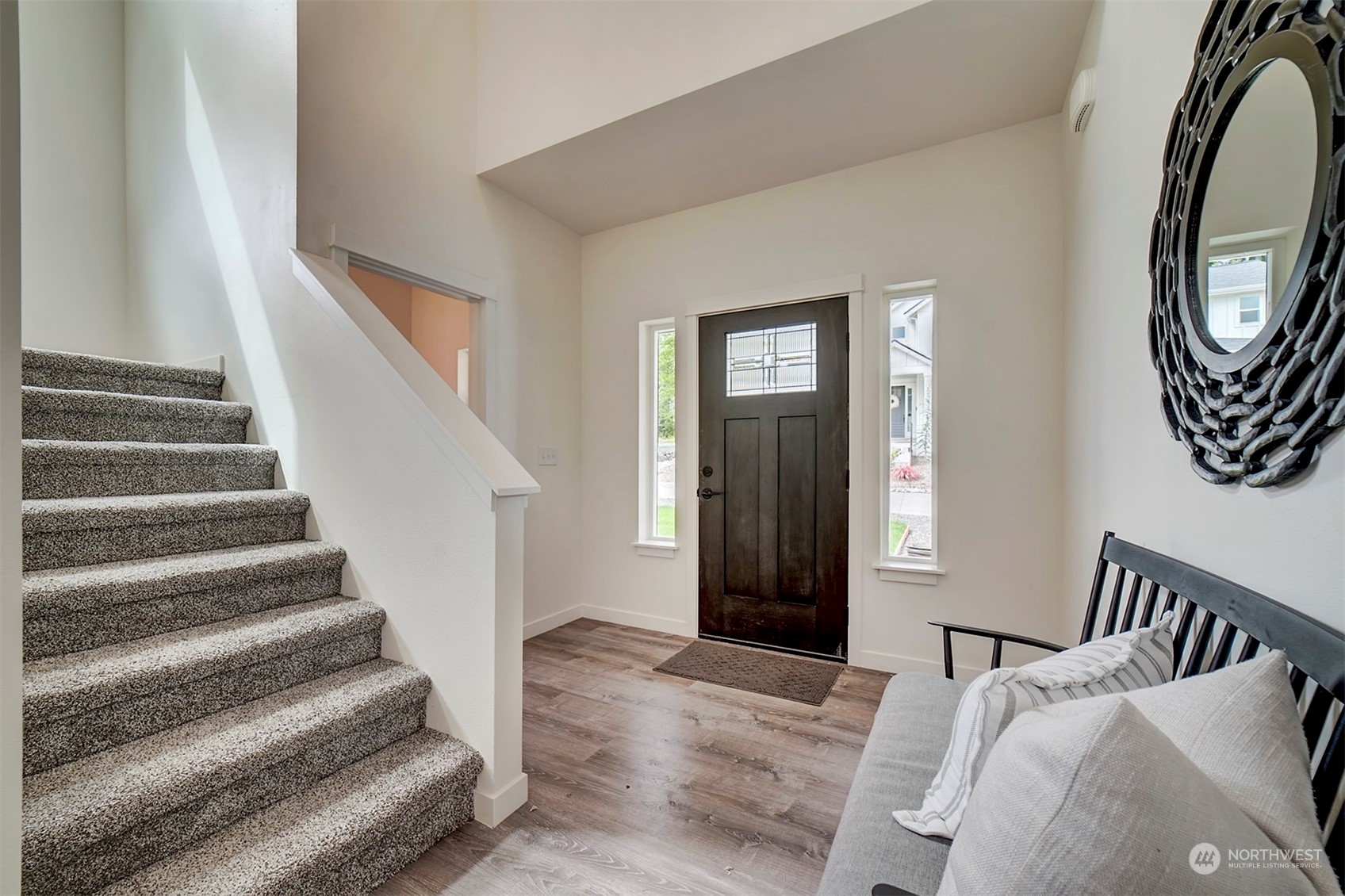 835 Northwest Finn Hill Road Poulsbo, WA 98370 - Photo 4 of 40 a view of a livingroom with furniture and staircase