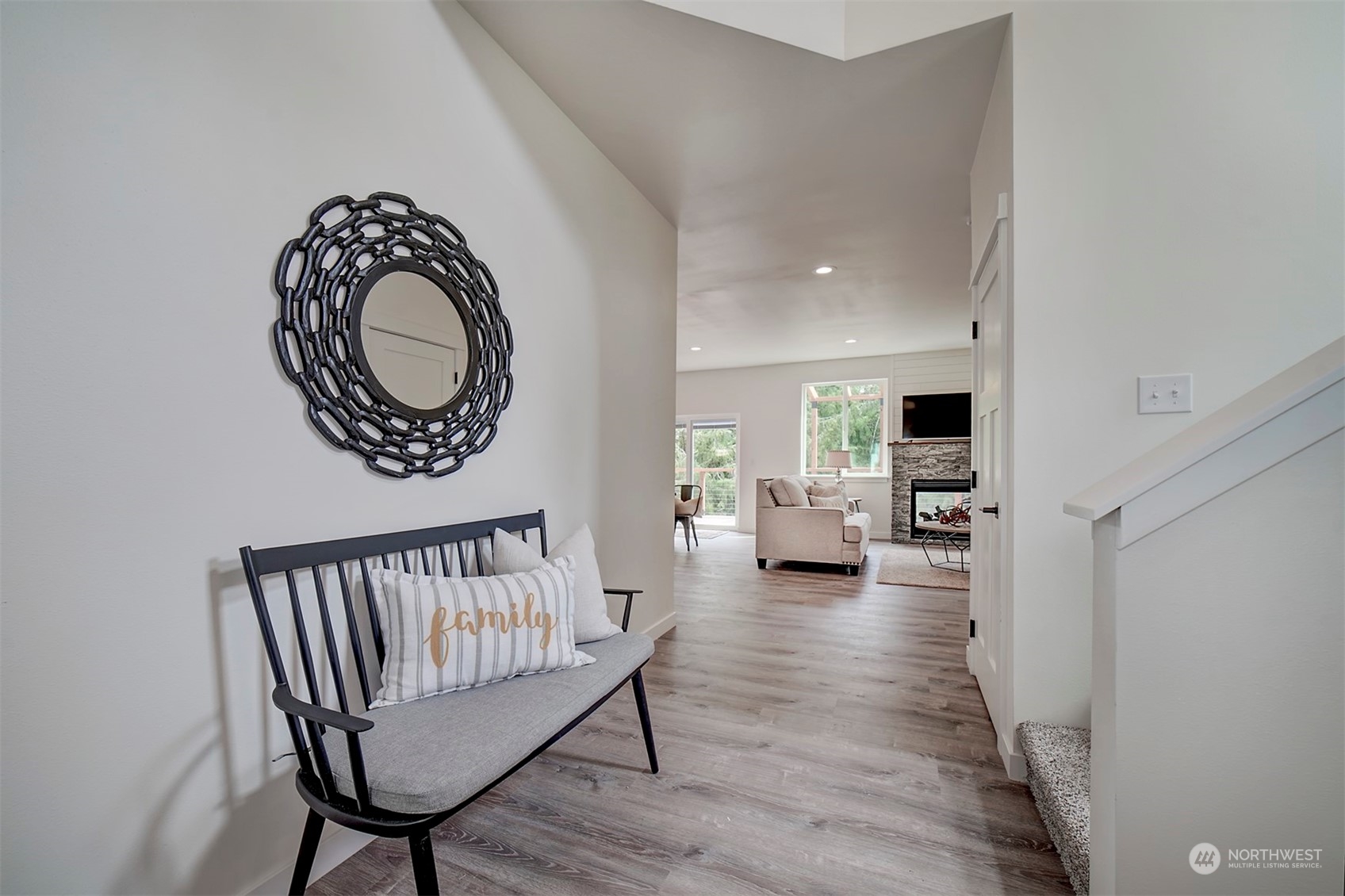 835 Northwest Finn Hill Road Poulsbo, WA 98370 - Photo 5 of 40 a living room with furniture and a wooden floor