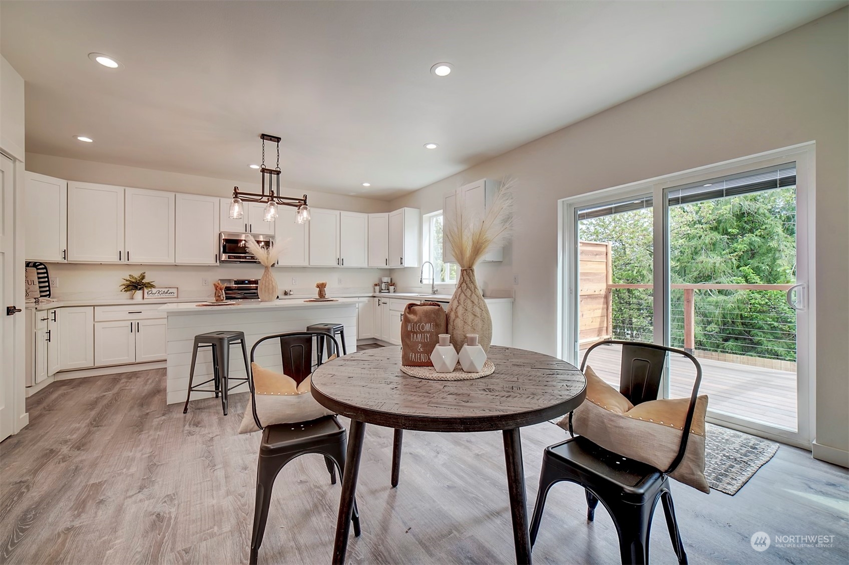 835 Northwest Finn Hill Road Poulsbo, WA 98370 - Photo 10 of 40 a view of kitchen with dining table and chairs