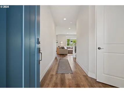 a bathroom with a sink and a view of bathroom