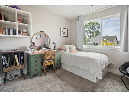 a view of a backyard with sitting area