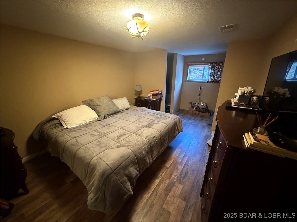 21 Mackey Road Rocky Mount, MO 65072 - Photo 14 of 33 Master Bedroom