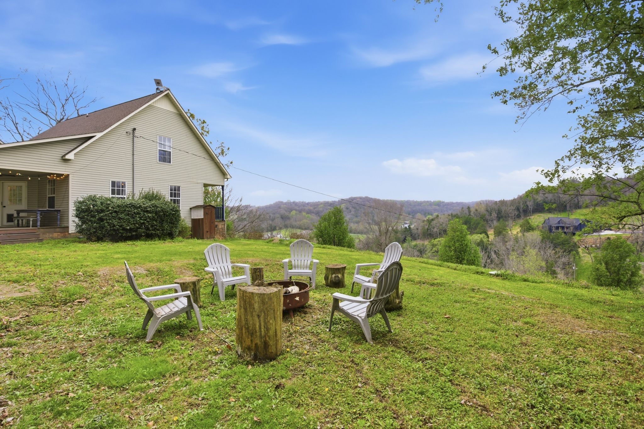 1469 Roy Sellers Road Columbia, TN 38401 - Photo 16 of 55 a view of a house with porch and a garden