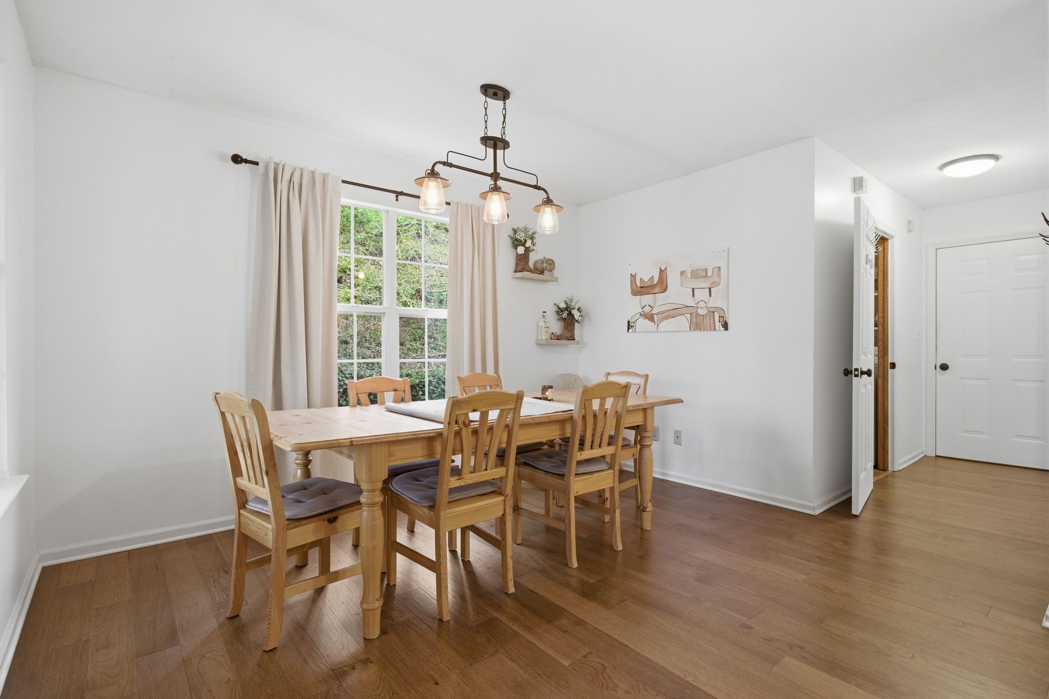1469 Roy Sellers Road Columbia, TN 38401 - Photo 26 of 55 a view of a dining room with furniture window and wooden floor