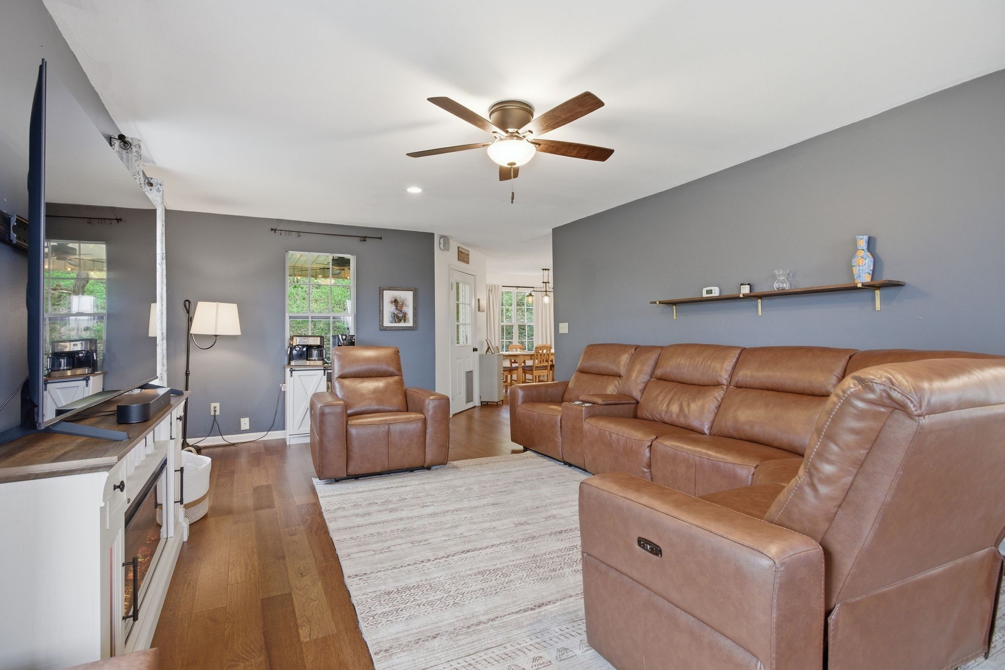 1469 Roy Sellers Road Columbia, TN 38401 - Photo 27 of 55 a living room with furniture and a chandelier