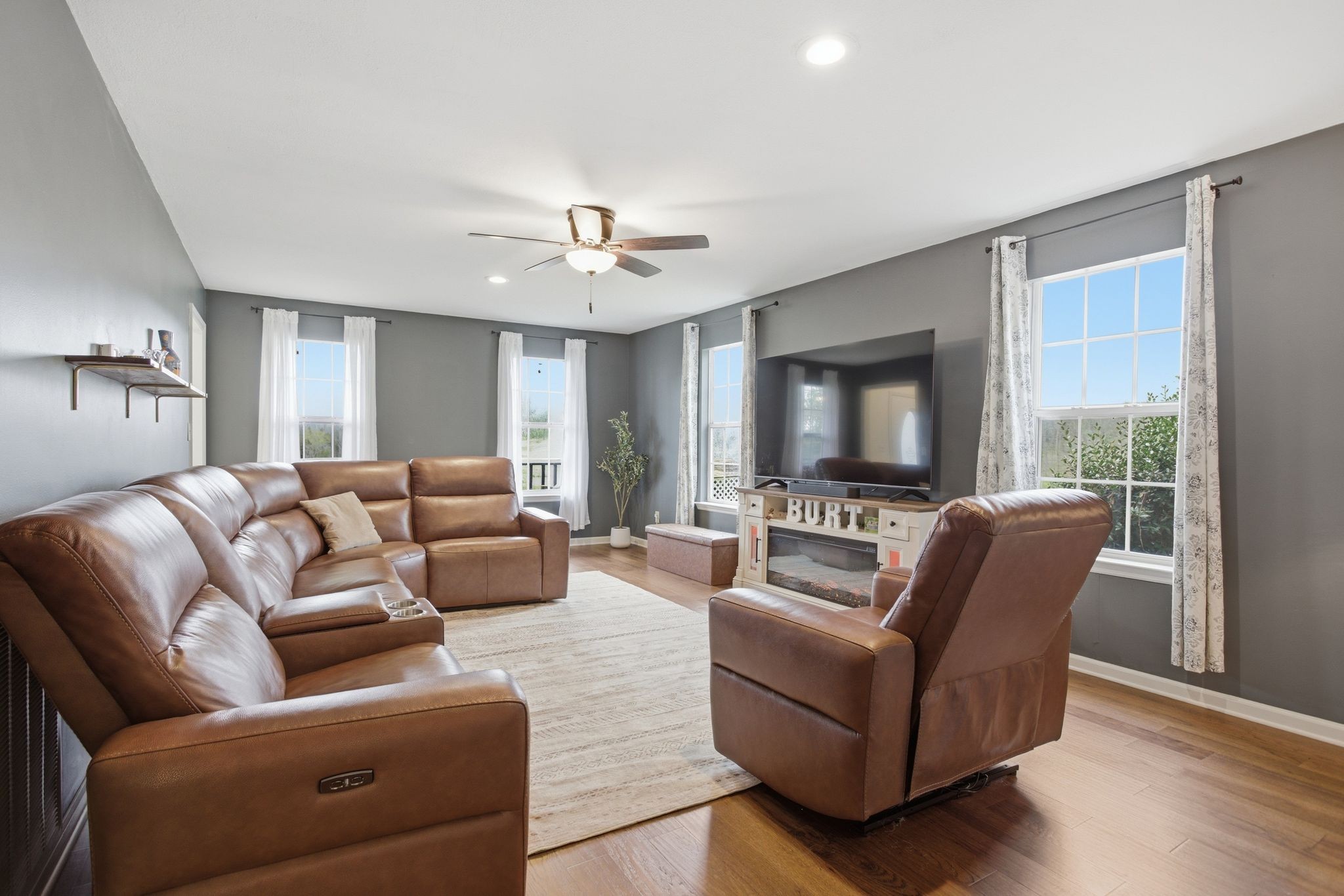 1469 Roy Sellers Road Columbia, TN 38401 - Photo 28 of 55 a living room with furniture and a flat screen tv